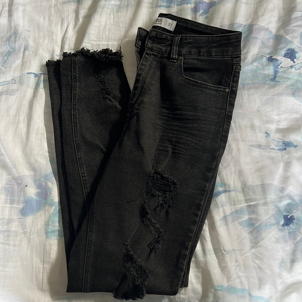 black ripped skinny jeans, stretchy and super flattering.